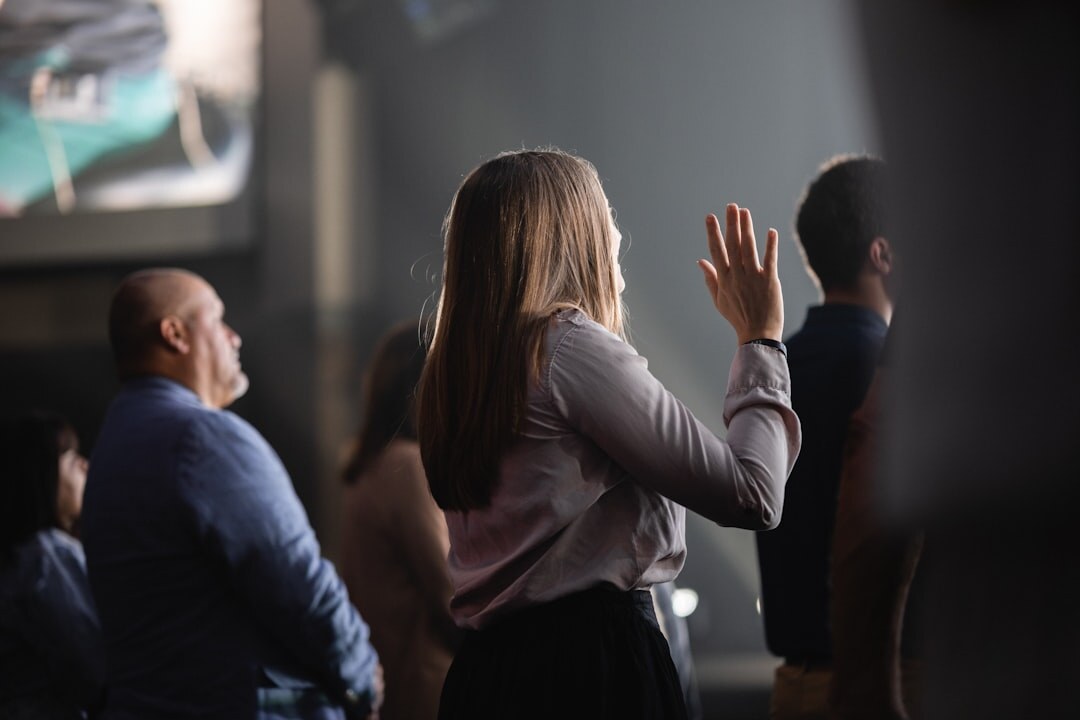 woman presenting to audience