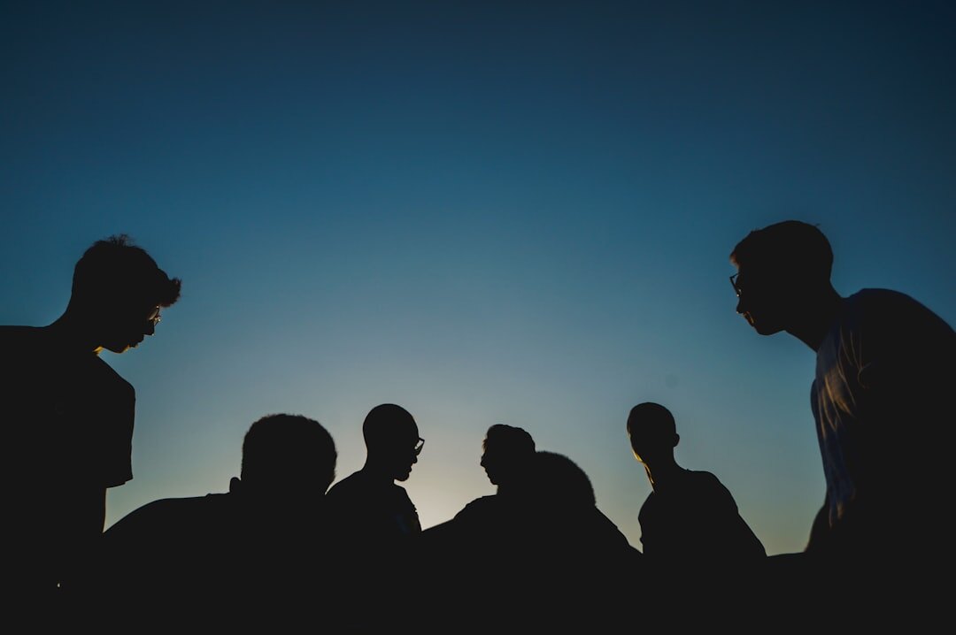Group of people talking in a discussion circle