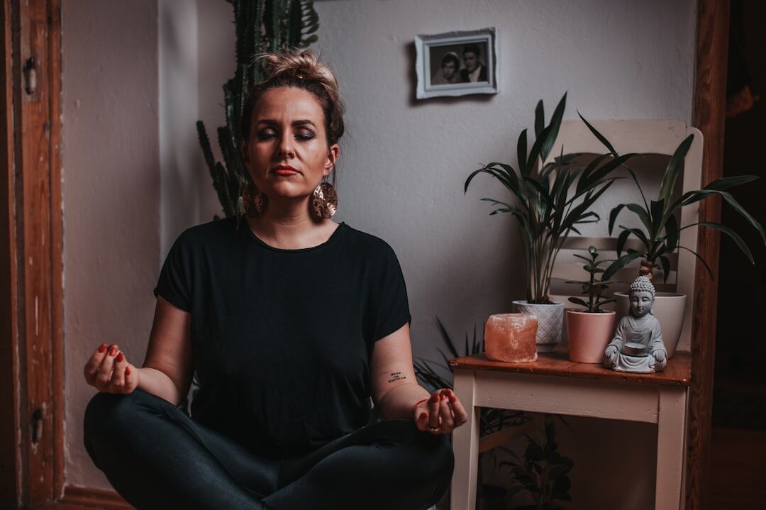 person meditating daily